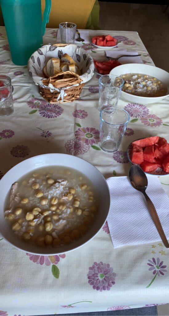 Garbanzo beans, rice and chicken with watermelon for our first meal at our host families