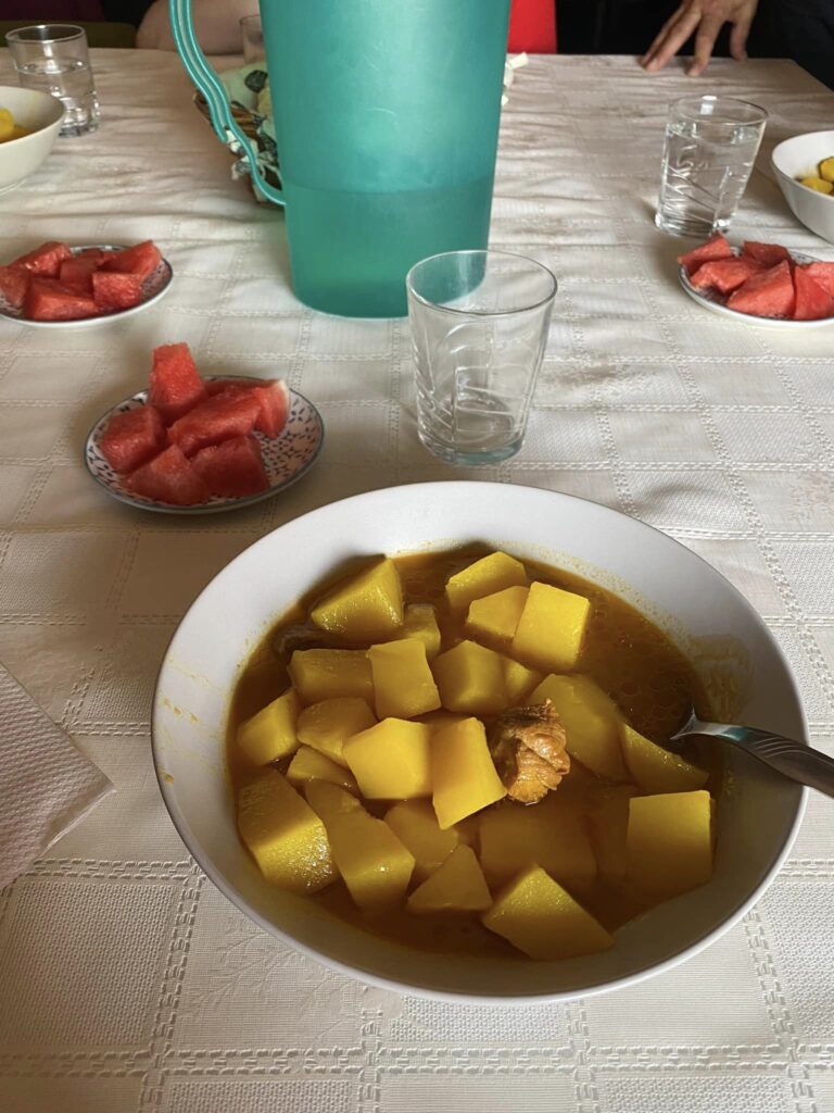 Patatas con carne with watermelon for lunch after Italica