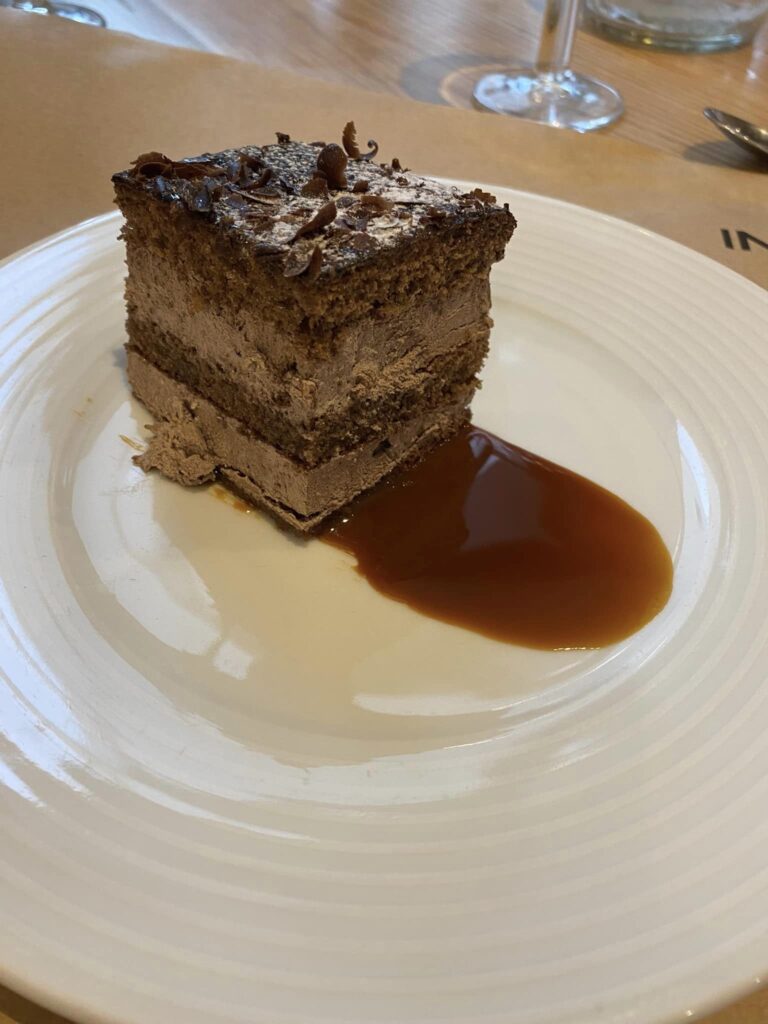 Layered chocolate cake for dessert after dinner at the hotel