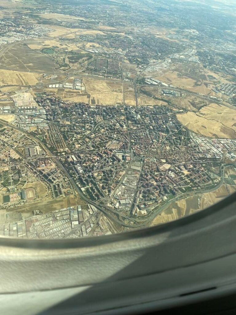 Flying over a city in Spain